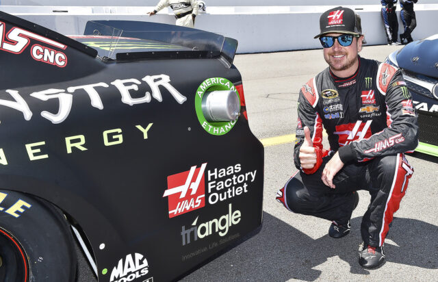 Kurt Busch posing with his winning car, #41