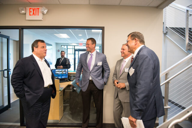 Triangle President and CEO greeting Governor Chris Christie